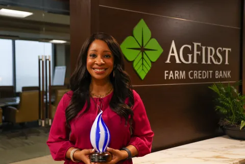 Stacy Willliams pictured with award