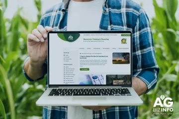 AgBizInfo.com screen on a laptop in field